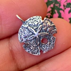 Sand dollar sterling silver pendant